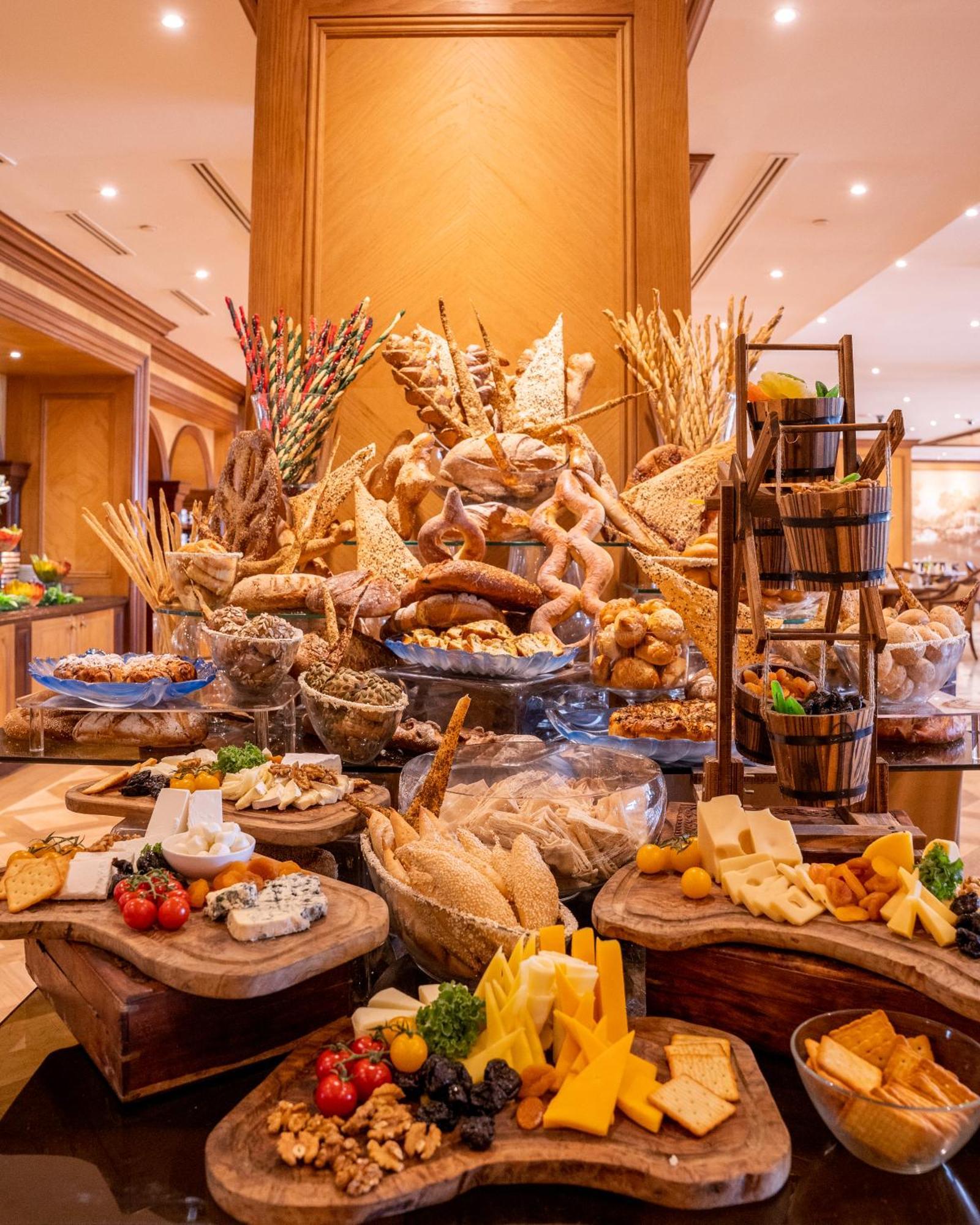 The Regency Hotel Kuwait Kuwait City Exterior foto A cheese display at a buffet